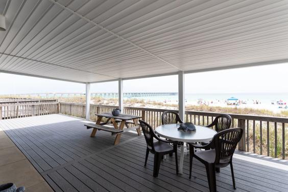 Step out on to the covered deck and take in the salty air!