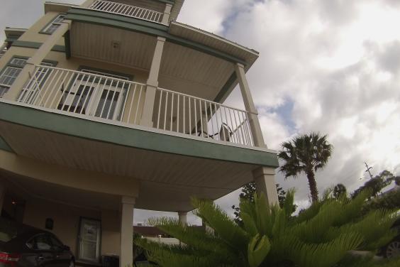 Stunning three story beach house, pet friendly with swimming pool.