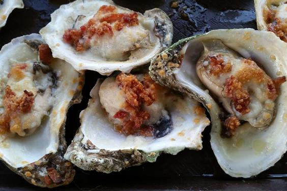 Baked oysters with butter, cheese, and bacon!