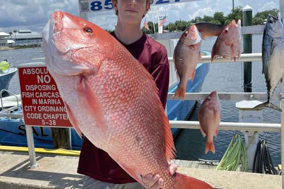 Kid with Big Red Snapper