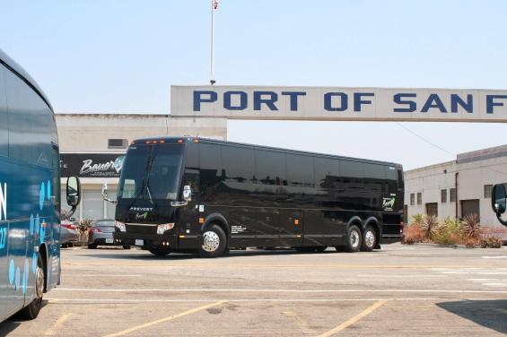 Motor coach pulling out of our HQ