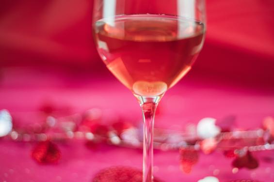 Wine with pink and red background