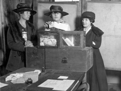 Three women voting for the first time