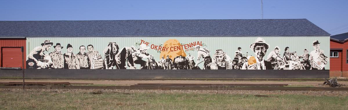 The Okray Family Farms mural in Plover depicts the company's founding fathers and celebrates the company's centennial!