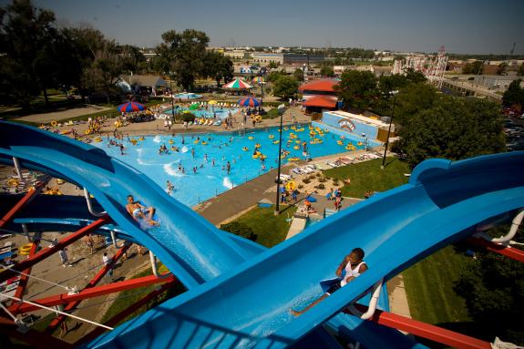 People on Water Slides and in Pool at Fun-Plex