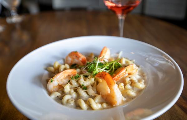 Pasta topped off with shrimp at Vino & Vinyl