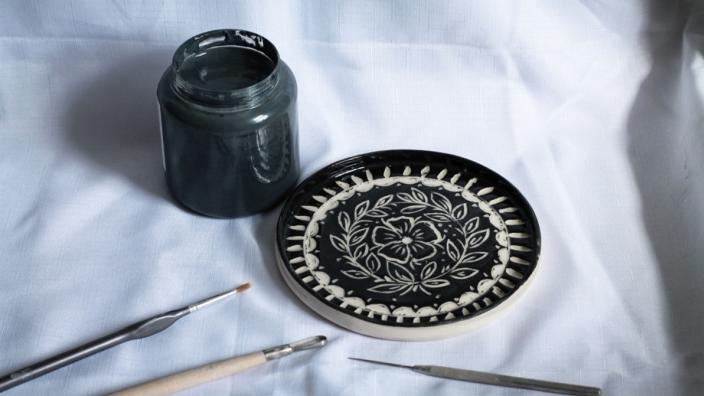 Ceramic plate carving at Flourish Glenavon Farm at Bath Road
