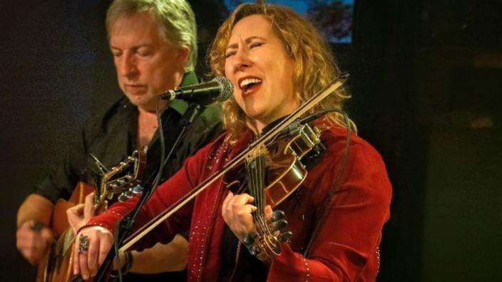 Sara Milonovich, with Greg Anderson at Hen and Chicken at 210 North Street