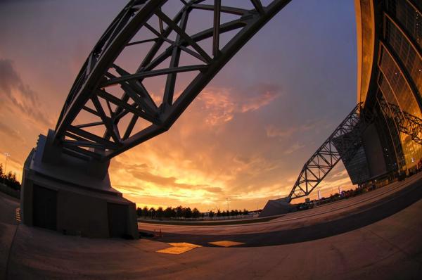 AT&T Stadium Arches in Front of a Sunset in Arlington