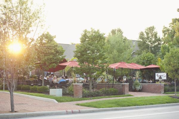 Tucci's outdoor dining patio at sunset.