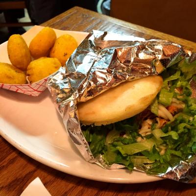Plate topped with Venezuelan Arepa from Arepazo restaurant