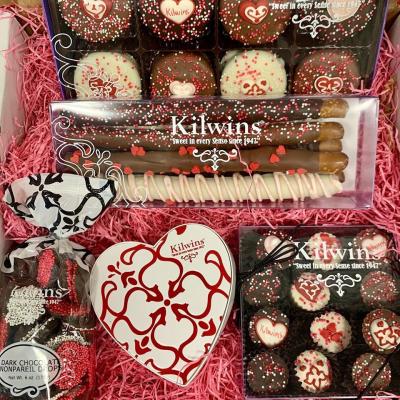 A box of assorted Valentine's themed candy from Kilwins