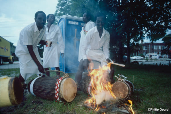 ©Philip Gould Rwanda Master Drummers heating skins
