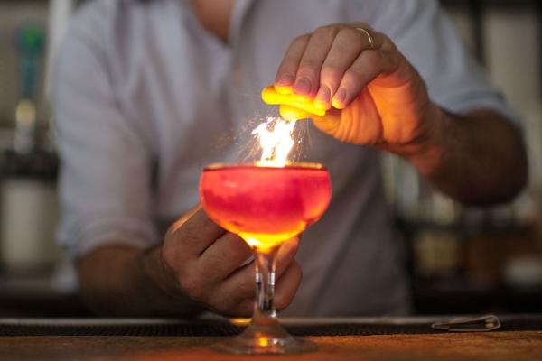 Flamed Orange Peel holiday drink by Crook's Corner