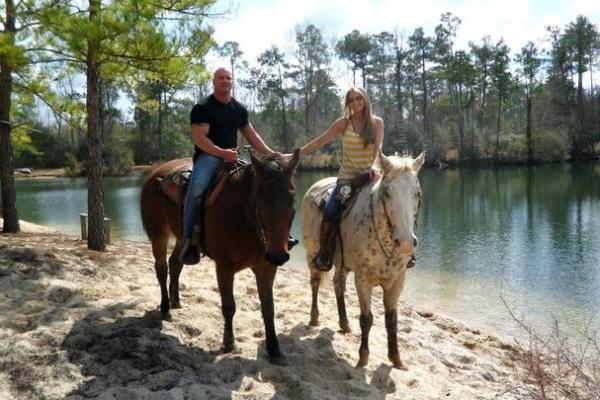 Couple Trail Riding at Splendor Farms