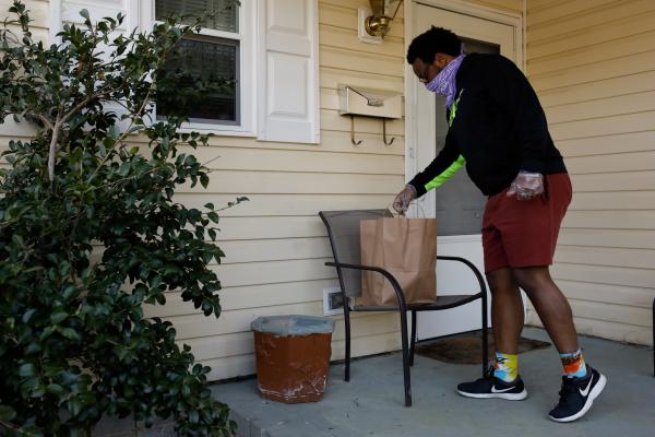 Delivering Food from Vimala's Curryblossom Cafe to Local Neighborhoods