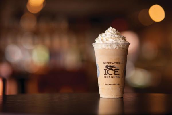 Carmel colored frozen drink with whipped topping.