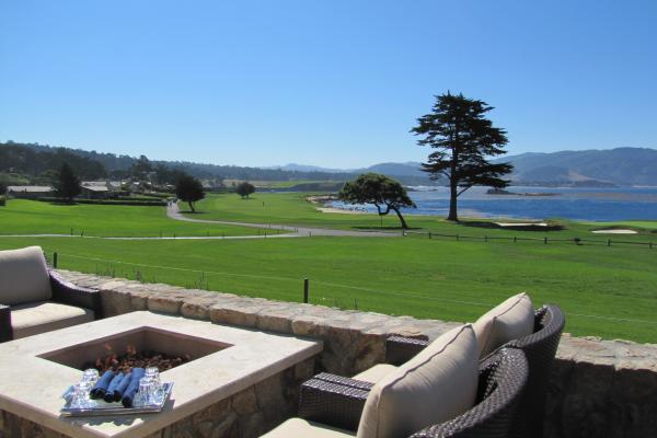 Outdoor seating at The Bench over looking Pebble Beach's golf course