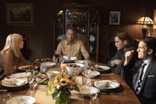 Actors from TV show Yellowstone sitting at dinner table