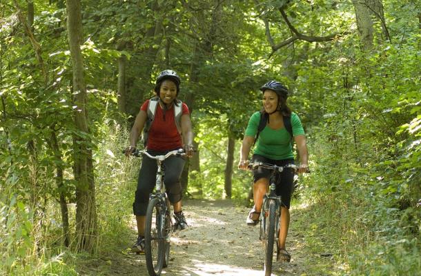 2 women cycling