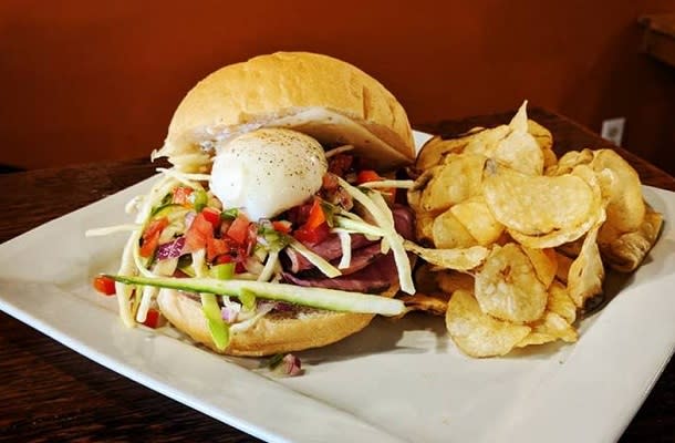 Burger and Kettle Chips on a plate