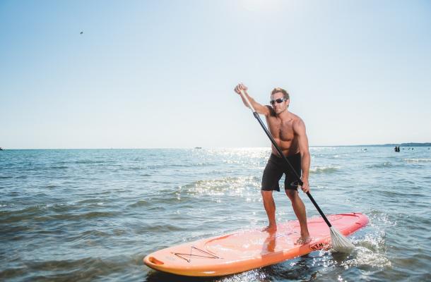 Person Paddle Boarding