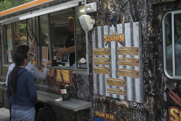 Couple orders food at PVDfest Food Village food truck