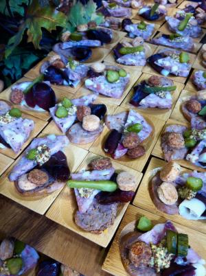 Wooden charcuterie plates at Taste of Dine Originals
