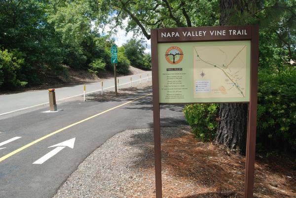 A roadside map outlines the route of the Napa Valley Vine Trail.