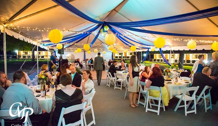 Wedding Reception Under Banquet Tent in Courtyard Wedding Reception Under Banquet Tent in Courtyard