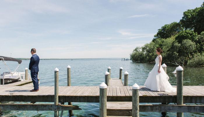 First look at a wedding on the dock First look at a wedding on the dock
