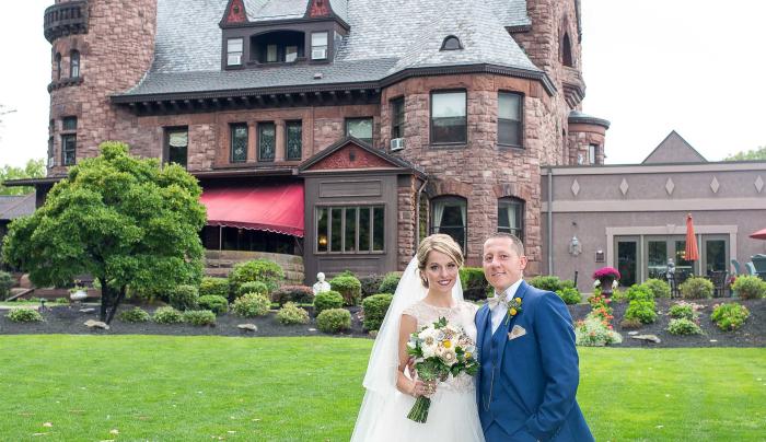 Photo of a bride and groom at an outdoor wedding at Belhurst Castle Photo of a bride and groom at an outdoor wedding at Belhurst Castle