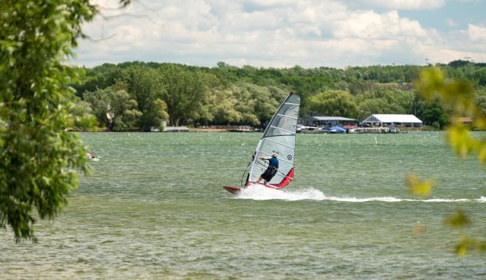 Person windsurfing on Canandaigua Lake Person windsurfing on Canandaigua Lake