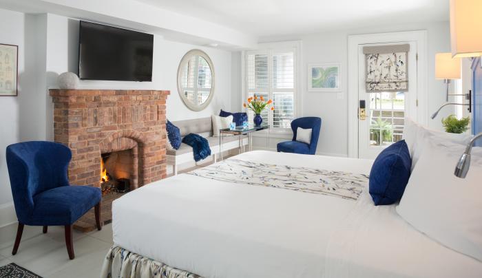 Saratoga Arms white room with fireplace Saratoga Arms white room with fireplace