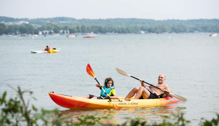 Photo of two kayakers enjoying a sunny day on Canandaigua Lake Photo of two kayakers enjoying a sunny day on Canandaigua Lake
