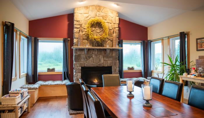 Interior of the dining area and fireplace at Mountain Horse Farms in Naples Interior of the dining area and fireplace at Mountain Horse Farms in Naples