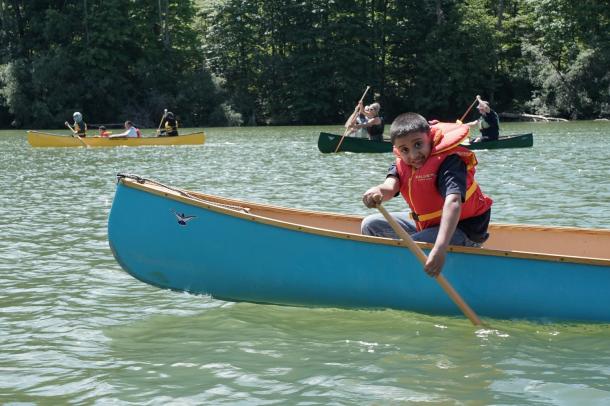 Boy paddling Sydenham River