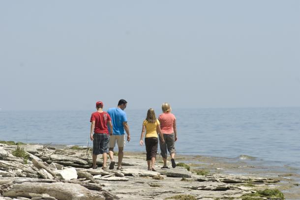 family walking on stone road alvar trail