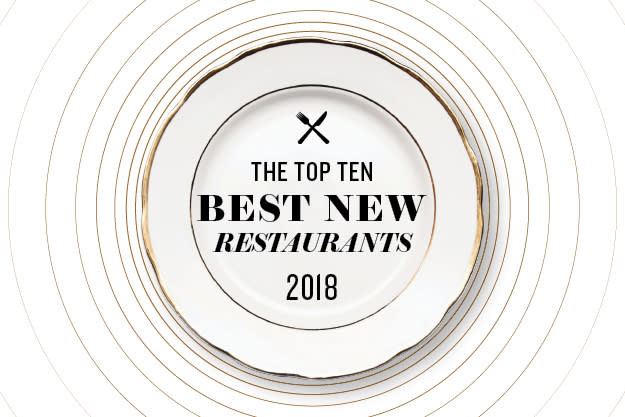 A white china plate with the words The top ten best new restaurants 2018 written on it