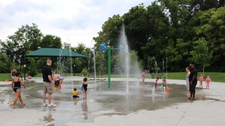 Families playing at McFee Park Splash Pad