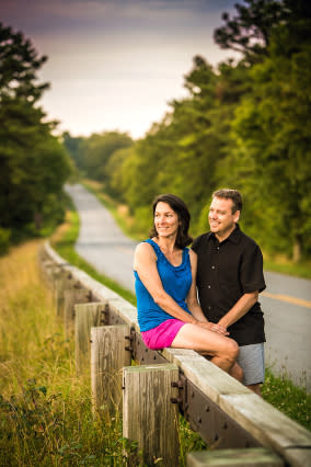 A couple enjoys the view along a scenic drive in Virginia