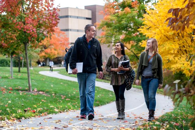 Students walking the Purdue University Fort Wayne campus in the fall.