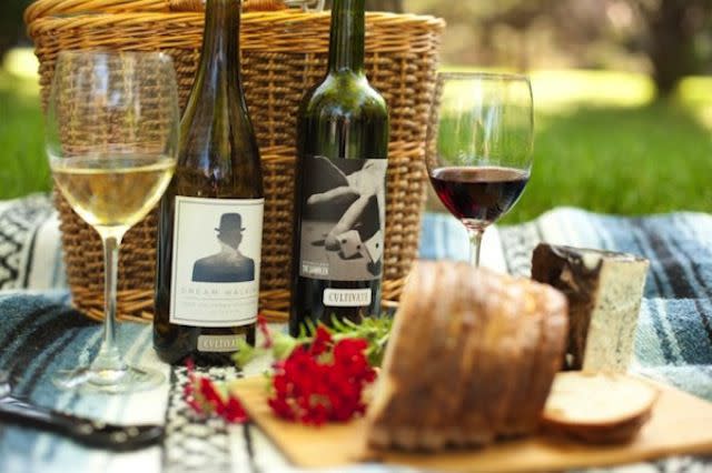 A picnic spread of wine and cheese