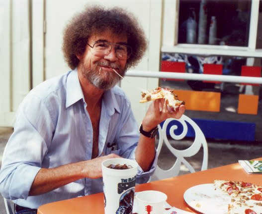 Bob Ross eating pizza