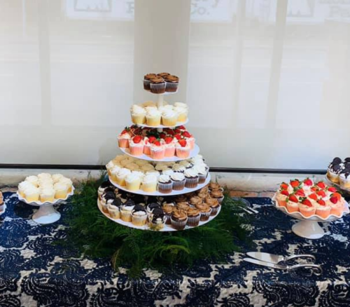 A tower of cupcakes in varying flavors from the home-based Dayton bakery Kia Cake & Company.