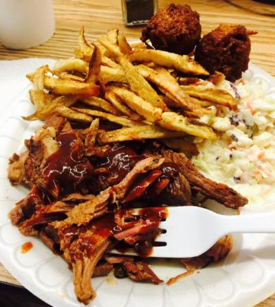 BBQ meat, french fries, hush puppies and coleslaw from Love That BBQ