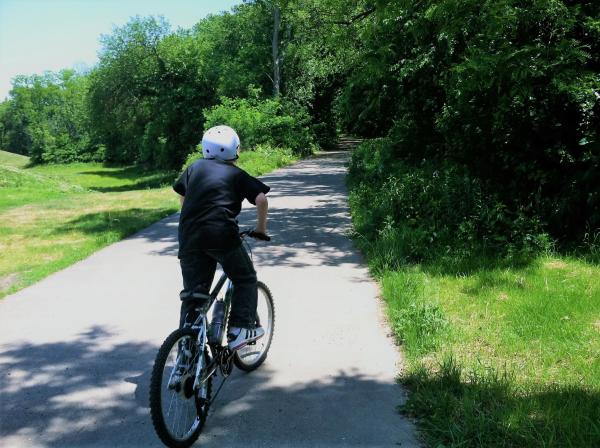 Ohio River Greenway, boy on bike