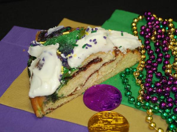 Traditional King Cake and beads at Zydeco's Cajun in Mooresville.