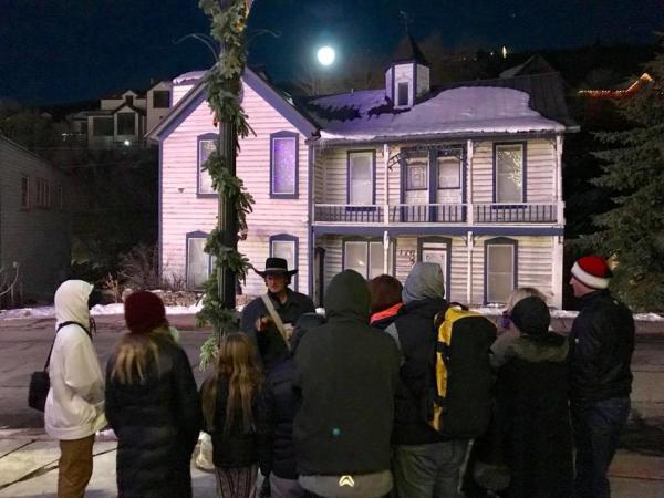Park City Ghost Tour, Host speaking to a group at night