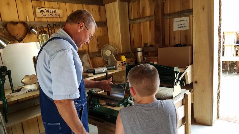 Meet the tinsmith at Waverly park and see how flat metal becomes useful objects.